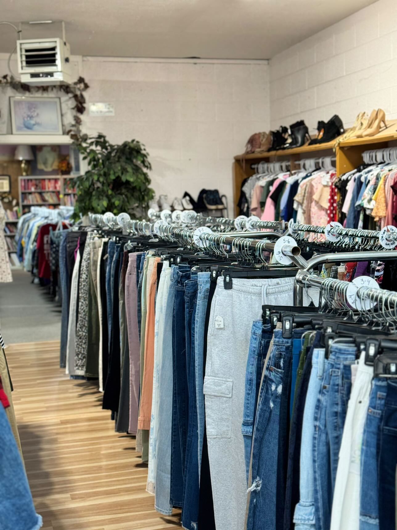 Jenny's Thrift Store interior with racks of clothing